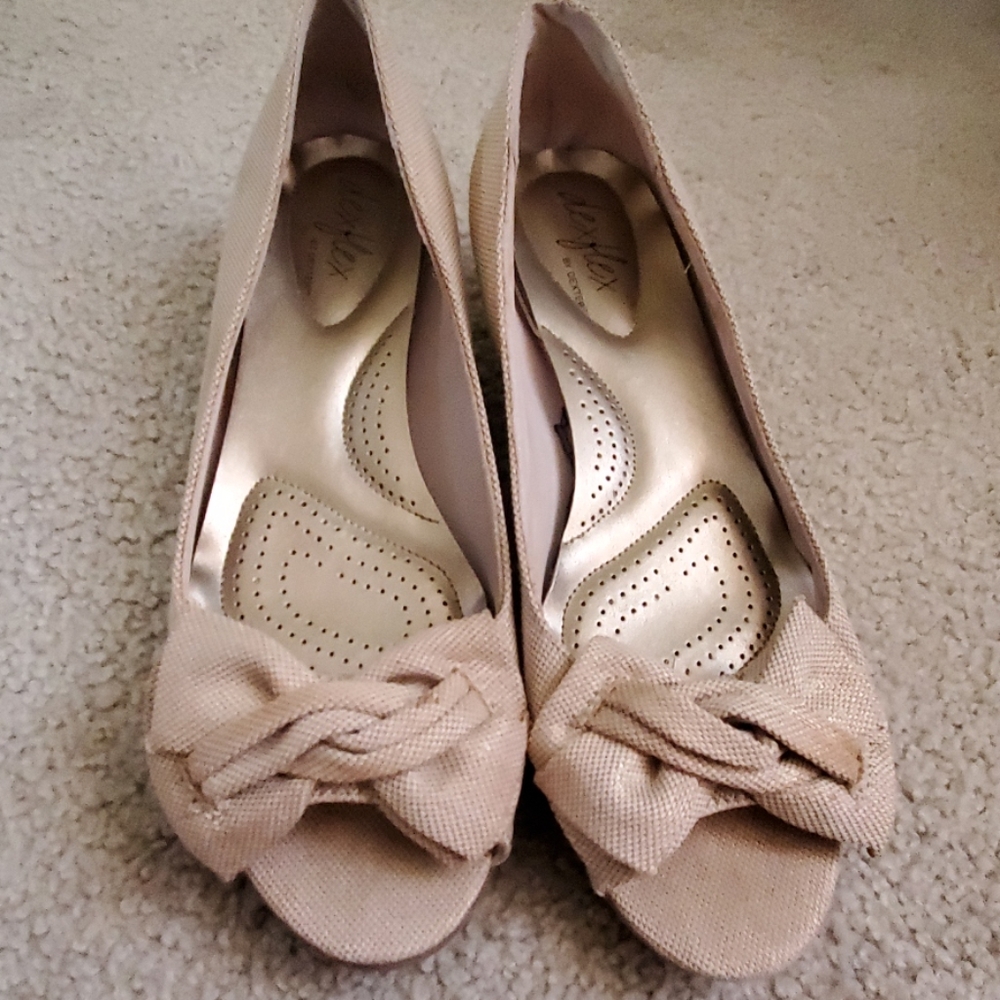 Low wedge open toe shoes.